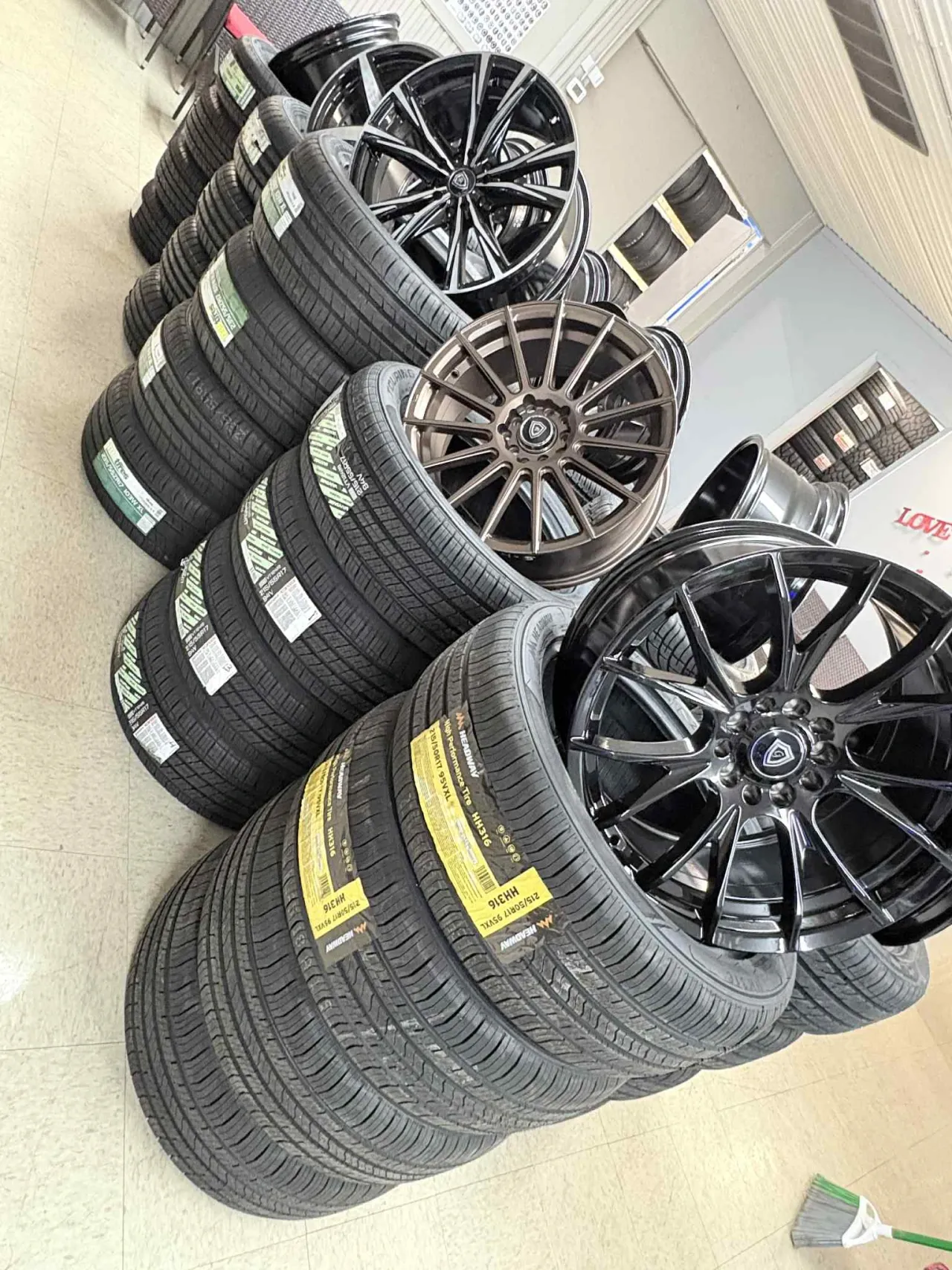 Wall of new and used tires in stock at Orizaba Tires & Auto Service, Eau Claire